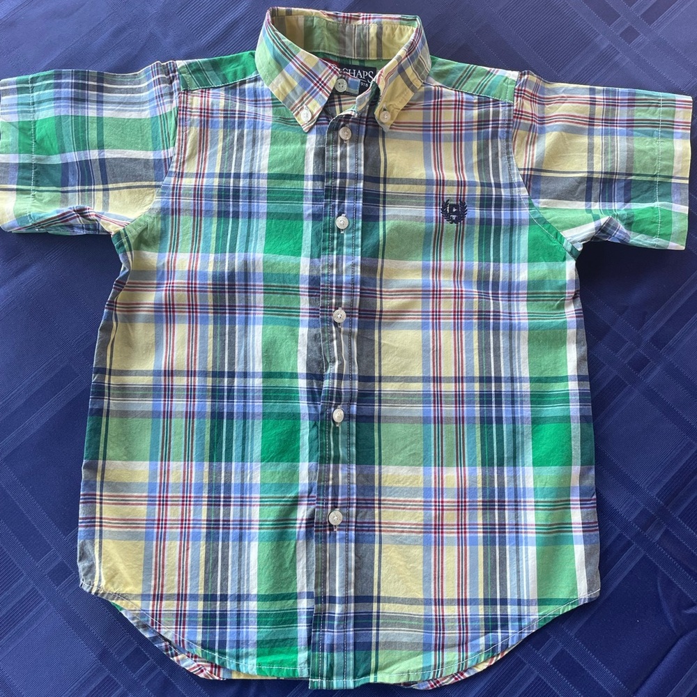 Boy’s plaid collar shirt. The colors are blue, green, yellow, and some red.